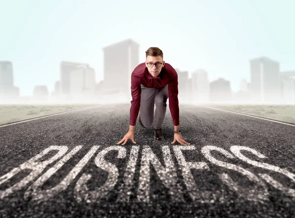 Businessman at start line — Stock Photo, Image