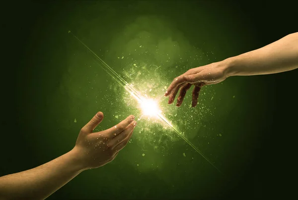 Touching arms lighting spark at fingertip — Stock Photo, Image