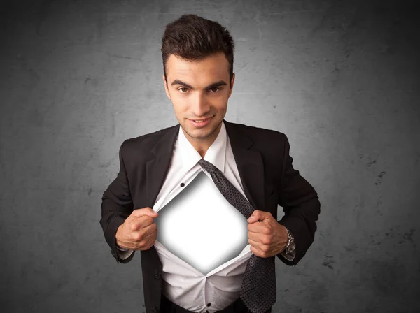 Businessman tearing off his shirt with white copyspace on chest — Stock Photo, Image