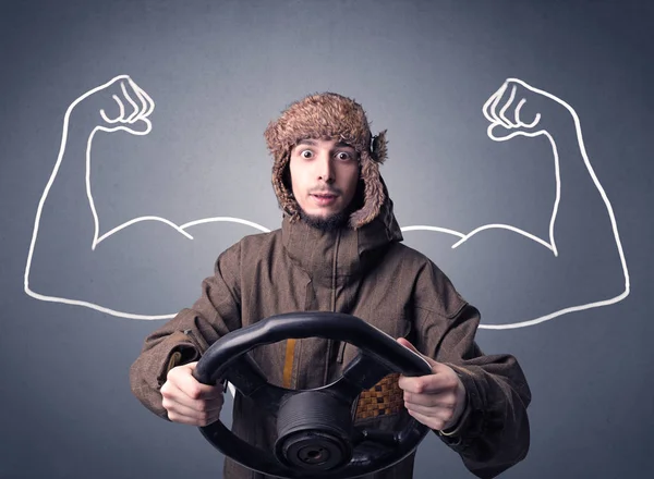 Man holding steering wheel — Stock Photo, Image