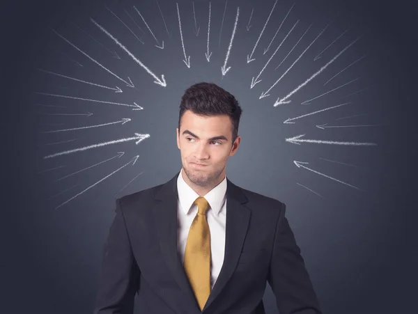 Businessman with arrows — Stock Photo, Image