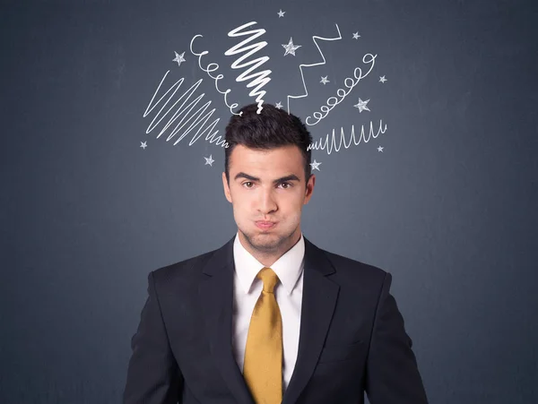 Businessman with scribbles — Stock Photo, Image