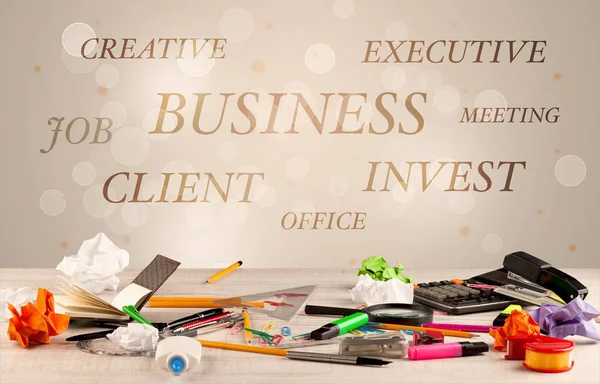 Business office desk with writing on wall — Stock Photo, Image