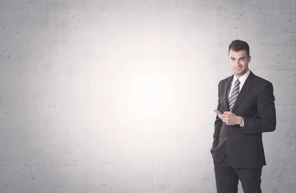 Elegante hombre de negocios con un fondo claro —  Fotos de Stock