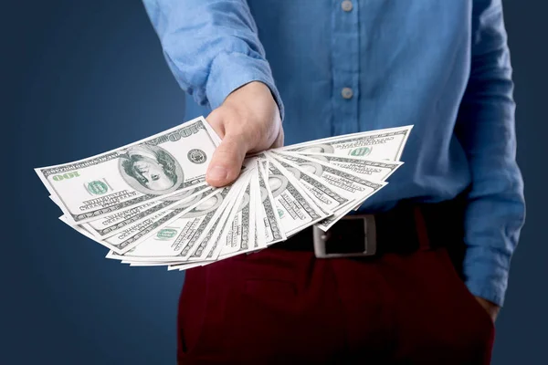 Businessman holding money — Stock Photo, Image