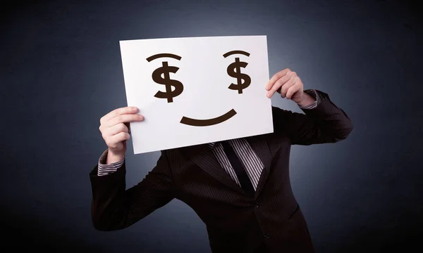 Empresário segurando papel com emoção gananciosa — Fotografia de Stock