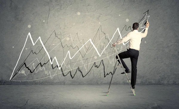 Man on ladder drawing lines — Stock Photo, Image