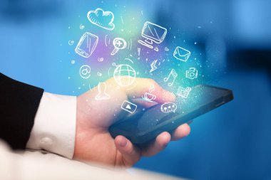 El smartphone Medya simgeler ile tutarak 