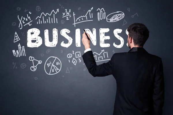 Businessman with business plan — Stock Photo, Image