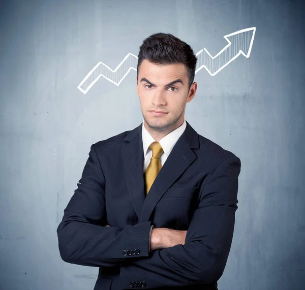 Smiling business guy with graph arrow — Stock Photo, Image