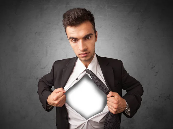 Businessman tearing off his shirt with white copyspace on chest — Stock Photo, Image