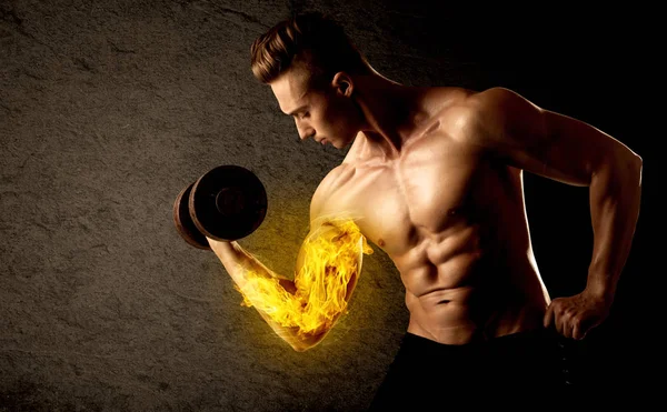 Muscular bodybuilder lifting weight with flaming biceps concept — Stock Photo, Image