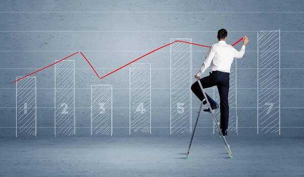 Man drawing chart from ladder — Stock Photo, Image