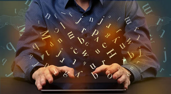 Man typing in formal clothing and letters around — Stock Photo, Image