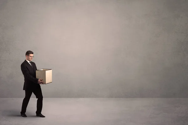 Businessman with empty box — Stock Photo, Image