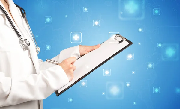 Female doctor with notepad — Stock Photo, Image