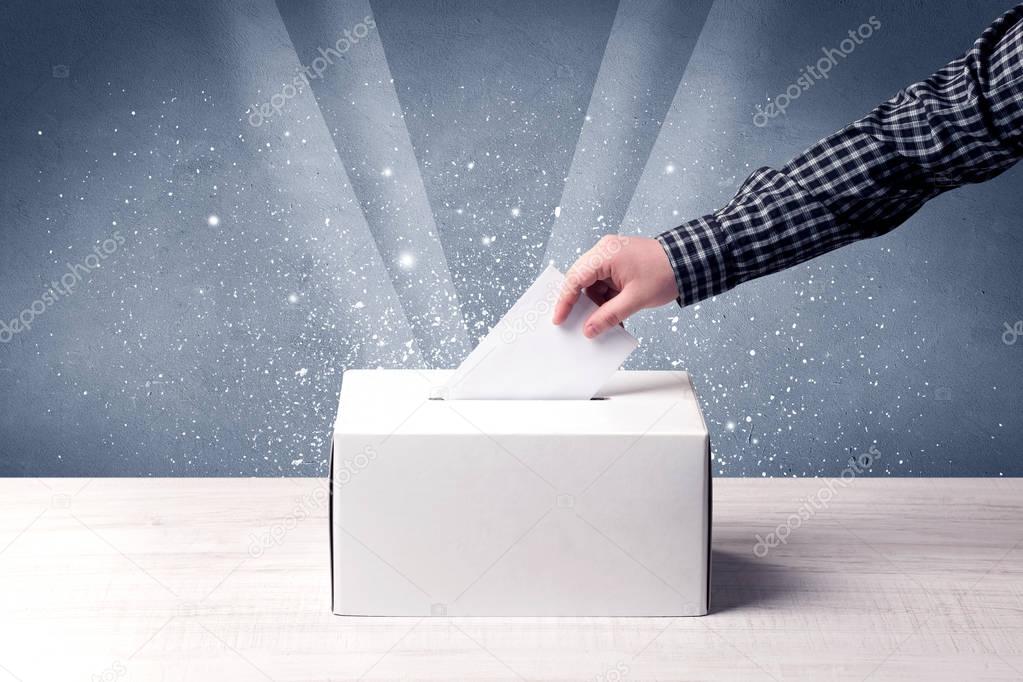 Ballot box with person casting vote