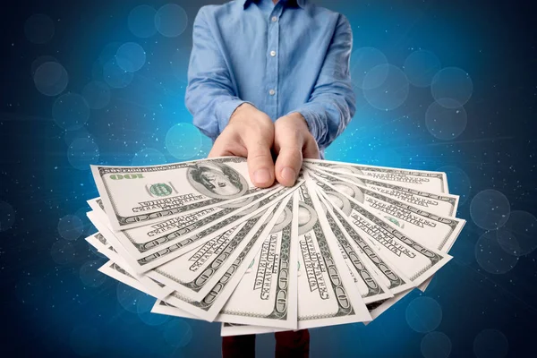 Businessman holding money — Stock Photo, Image