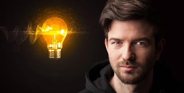 Retrato de un joven empresario sobre fondo oscuro — Foto de Stock