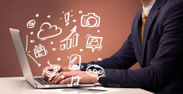 Office worker sitting in front of laptop — Stock Photo, Image