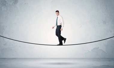 Satış adam sıkı ipe Dengeleme