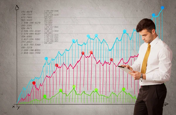 Gráfico colorido con números y hombre de negocios — Foto de Stock