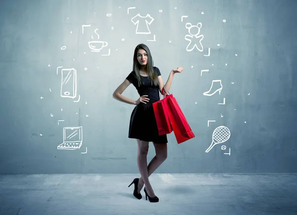 Mujer de compras con bolsos e iconos dibujados —  Fotos de Stock