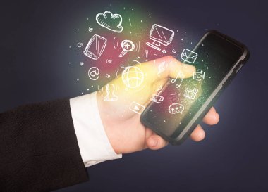 El smartphone Medya simgeler ile tutarak 