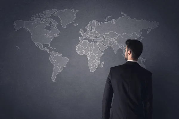 Businessman with world map