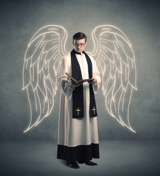 Young priest in giving his blessing — Stock Photo, Image