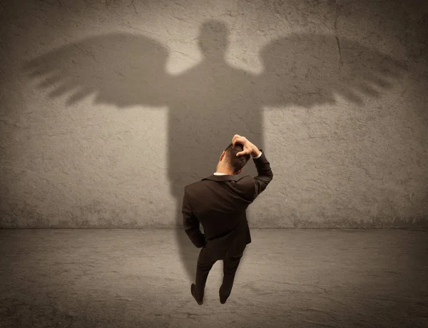 Vendedor honesto com conceito de sombra de anjo — Fotografia de Stock