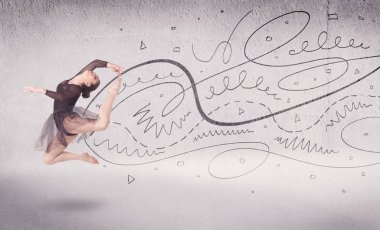 Bale dansçısı çizgiler ve oklarla sanat dansı yapıyor.