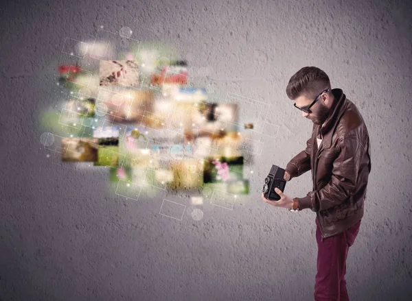 Young malewith beard taking vintage photos — Stock Photo, Image