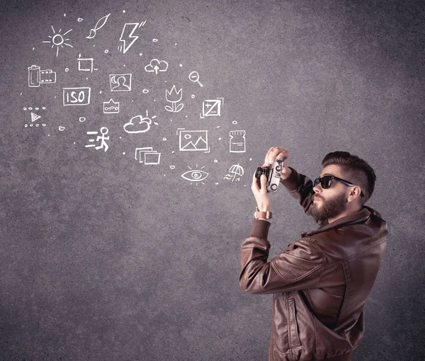 Elegant guy with beard learning photography — Stock Photo, Image