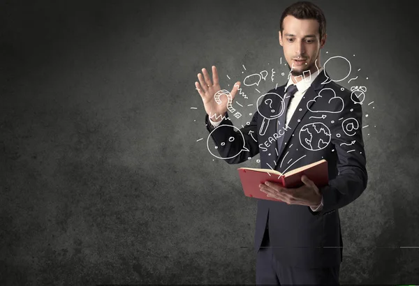 Businessman holding a book. — Stock Photo, Image