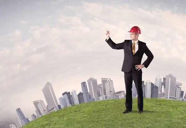 Man standing in front of city landscape — Stock Photo, Image