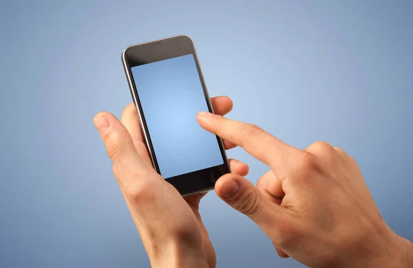 Female hand holding smartphone — Stock Photo, Image