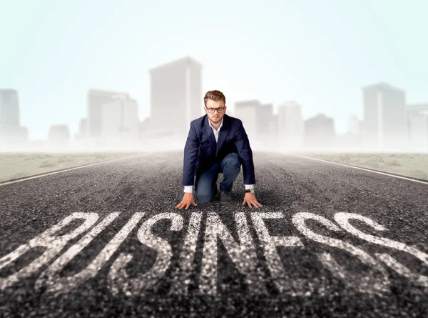 Businessman at start line — Stock Photo, Image