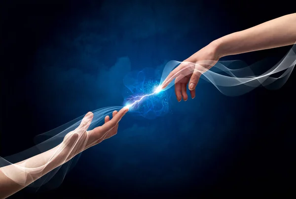 Hands connecting through fingers in space