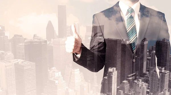 Handsome business man with overlay cityscape — Stock Photo, Image