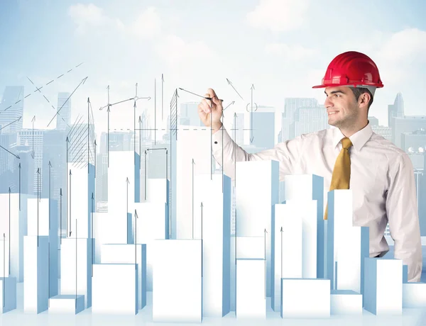 Businessman drawing skyscrapers — Stock Photo, Image