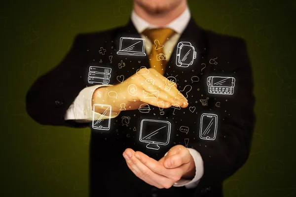 Businessman holding networking icons — Stock Photo, Image