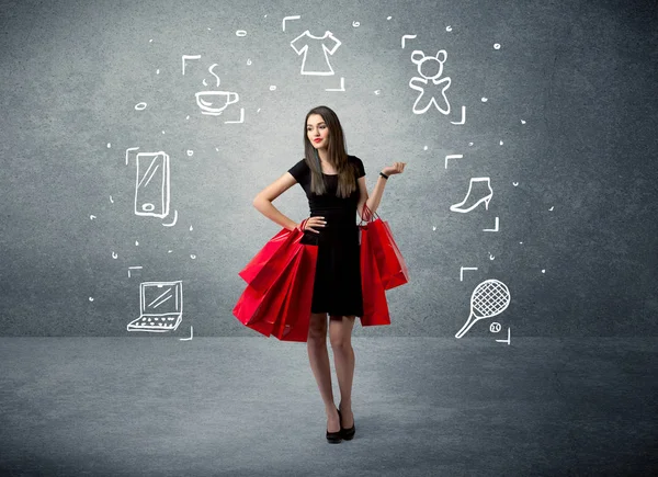 Shopping female with bags and drawn icons — Stock Photo, Image