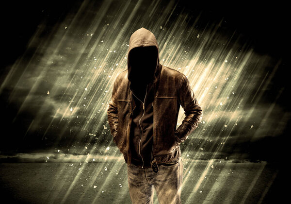 Dangerous criminal standing with cigarette