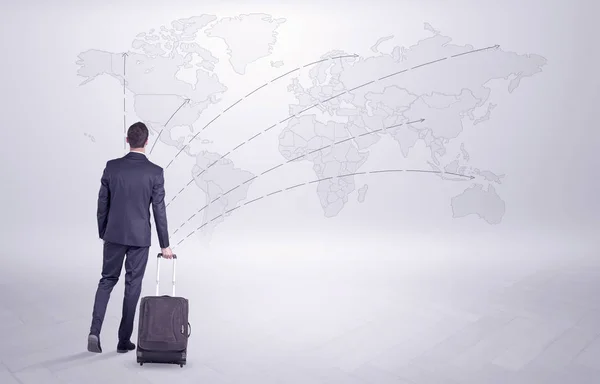 Biznesmen planowania jego podróży na całym świecie — Zdjęcie stockowe