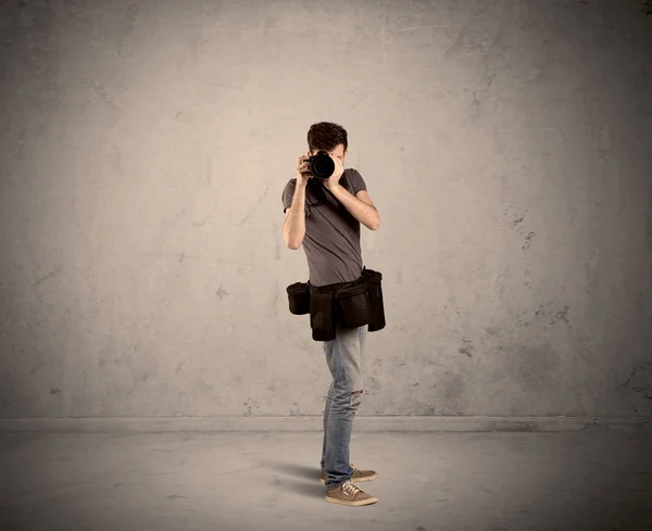 Hobby photographer holding camera — Stock Photo, Image