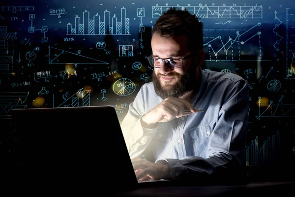 Businessman in the office at night — Stock Photo, Image