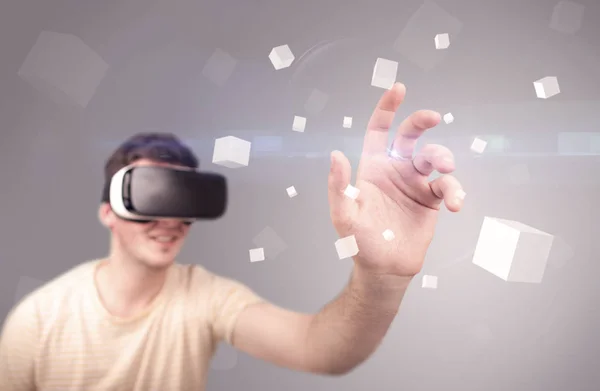 Man wearing virtual reality goggles — Stock Photo, Image