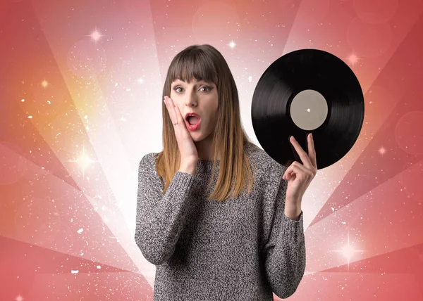 Lady holding vinyl record — Stock Photo, Image