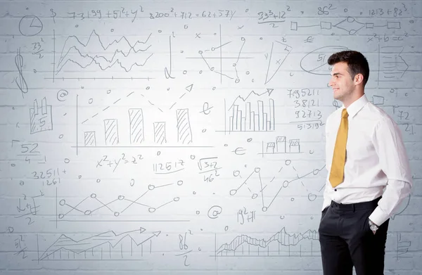 Salesman standing with drawn graph charts — Stock Photo, Image